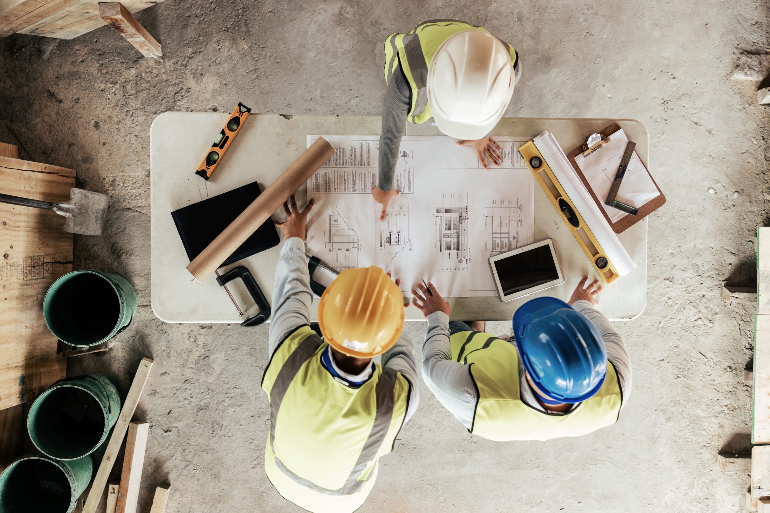 Top,View,,Construction,Workers,Or,Blueprint,Planning,In,House,,Home